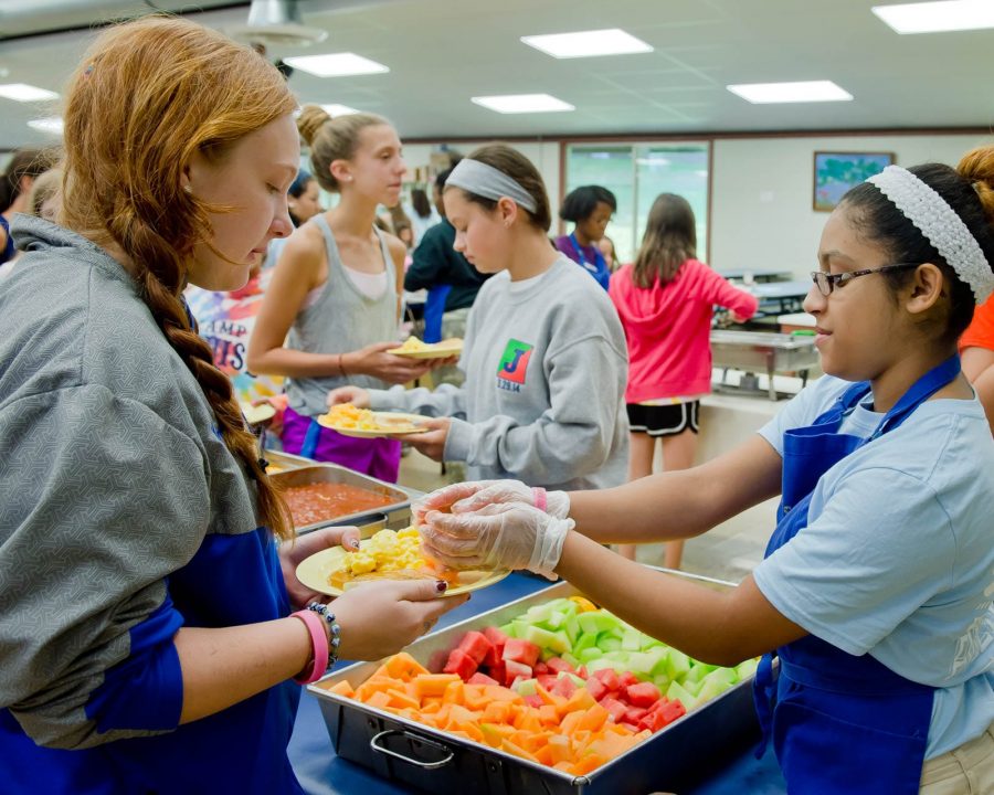 Serving breakfast at Camp Louise