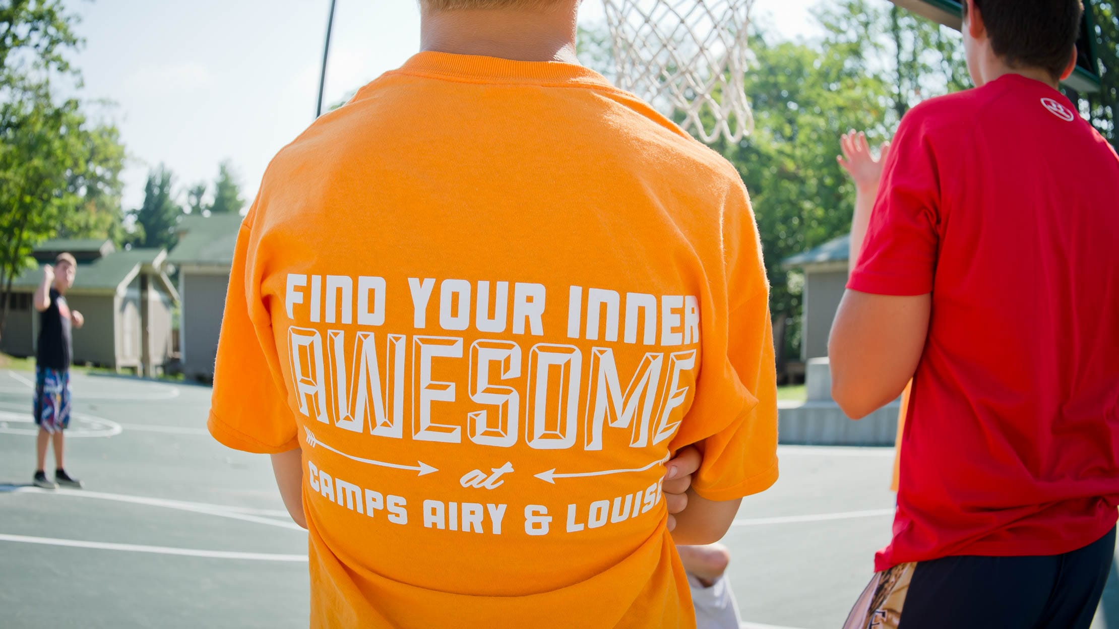 Camper wearing a "Find Your Inner Awesome" shirt