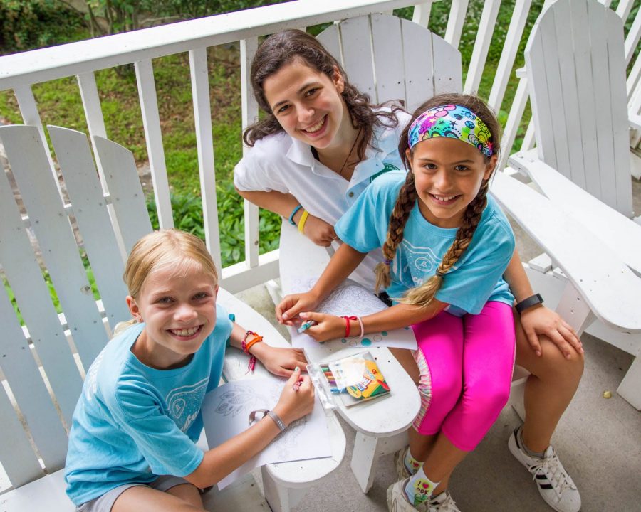 Girls and staff coloring