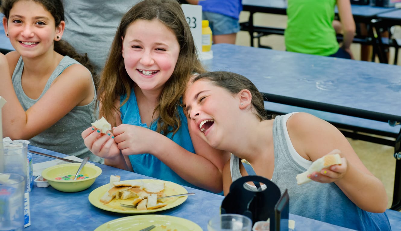 Louise girls eating in the dining hall