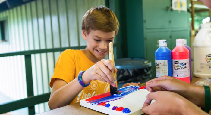 Airy camper painting during arts & crafts