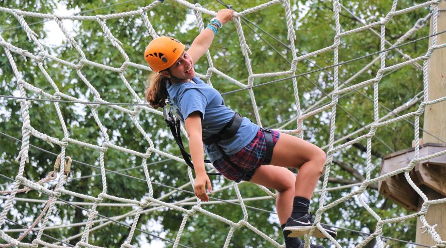 Camper on ropes course