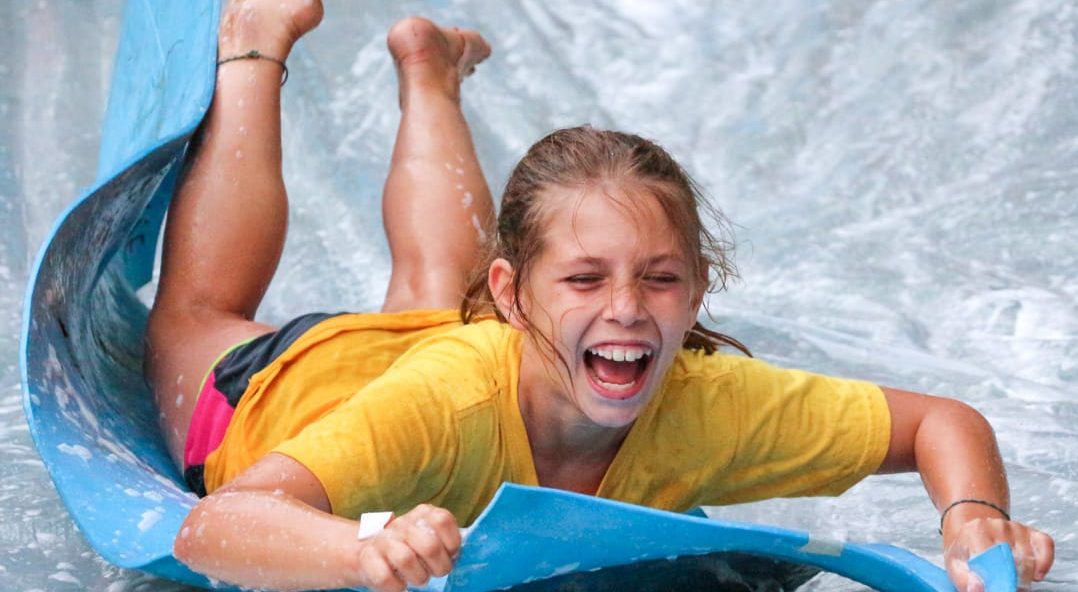 Louis camper on slip-n-slide